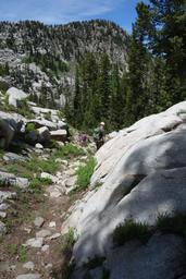 Pam and ed start the descent from the upper bowl [sat jun 20 12:57:19 mdt 2015]